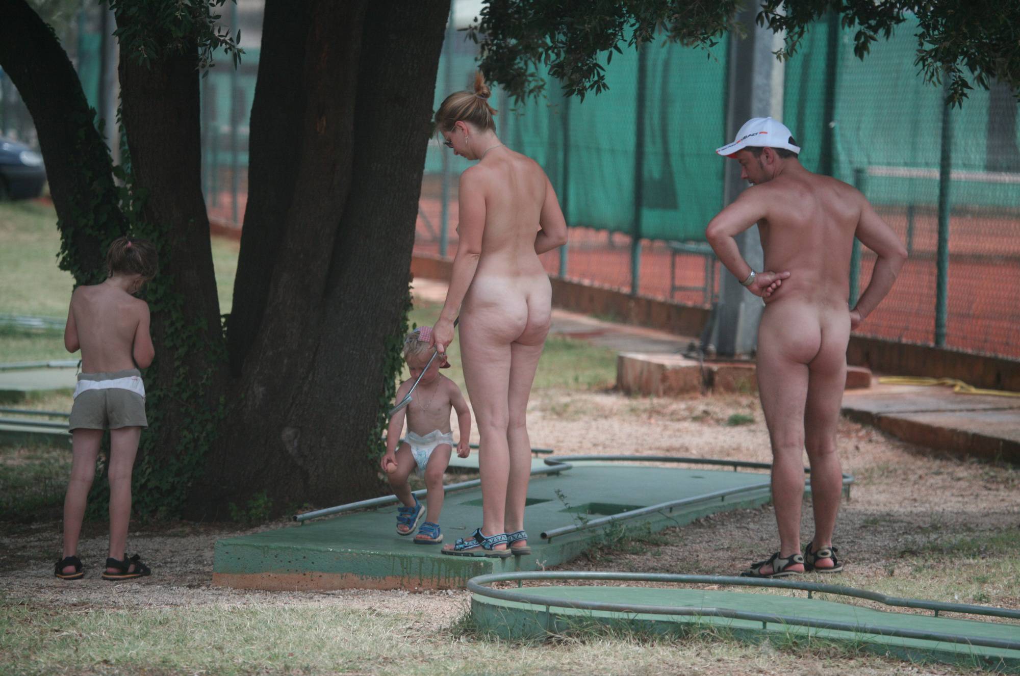 [Image: Nudist-Family-Mini-Golfing-Purenudism-1.jpg]