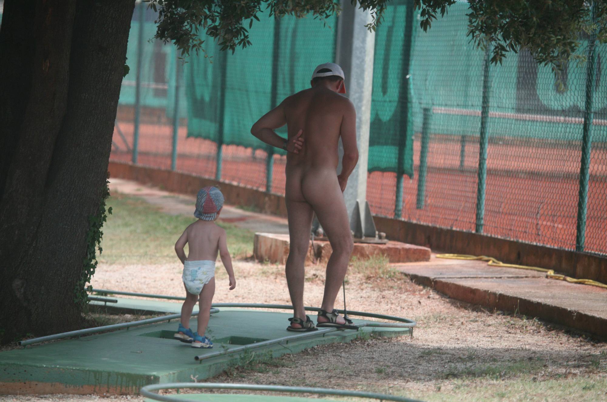 [Image: Purenudism-Pics-Nudist-Family-Mini-Golfing-4.jpg]